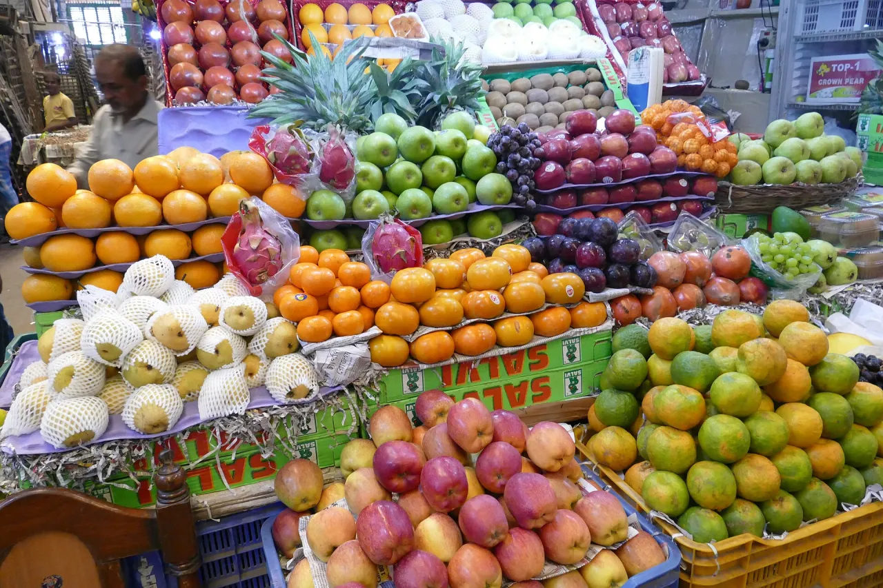 Produce display at a fruit market stall